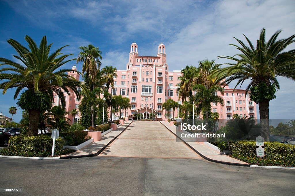 Front view of a hotel building with a modern design and welcoming entrance, similar to Comfort Suites Tampa - USF Near Busch Gardens.