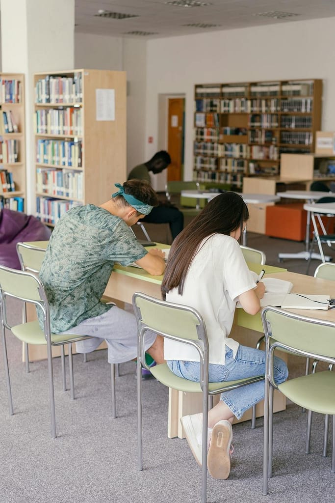 Students study peacefully in Lincoln University's serene library, surrounded by a welcoming atmosphere that fosters academic excellence.